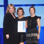 3 ladies accepting an award