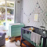 Trellis Wallpaper in large size, printed in habitat baby grey colour. This nursery was styled by Jen Bishop.