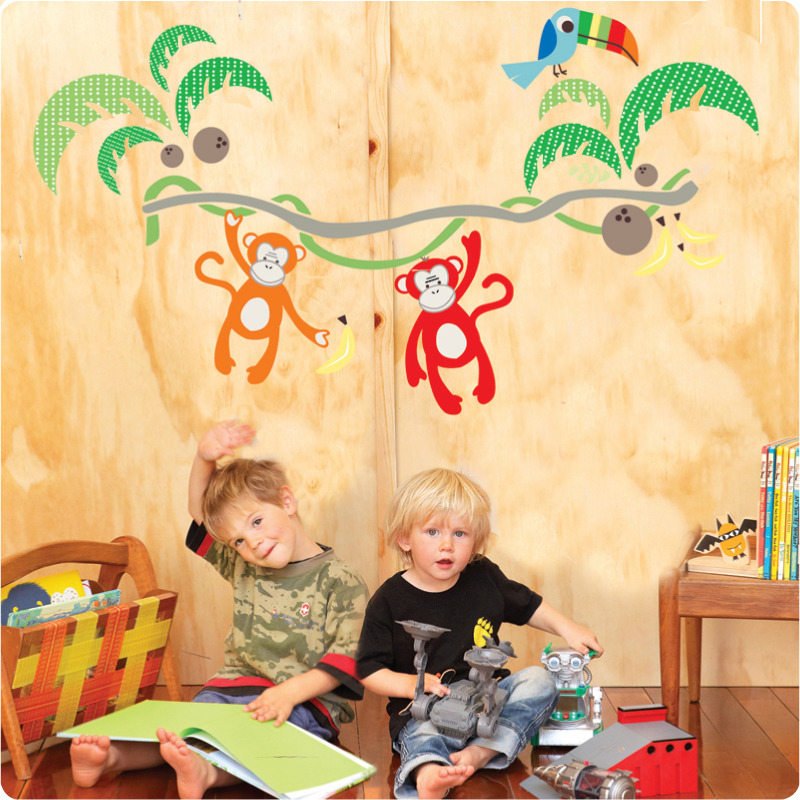 Jungle Canopy Removable Wall stickers with a 2 cute little boys playing in front
