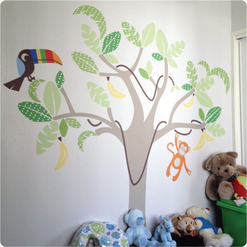 Jungle Land Removable Wall stickers behind the stuffed toys