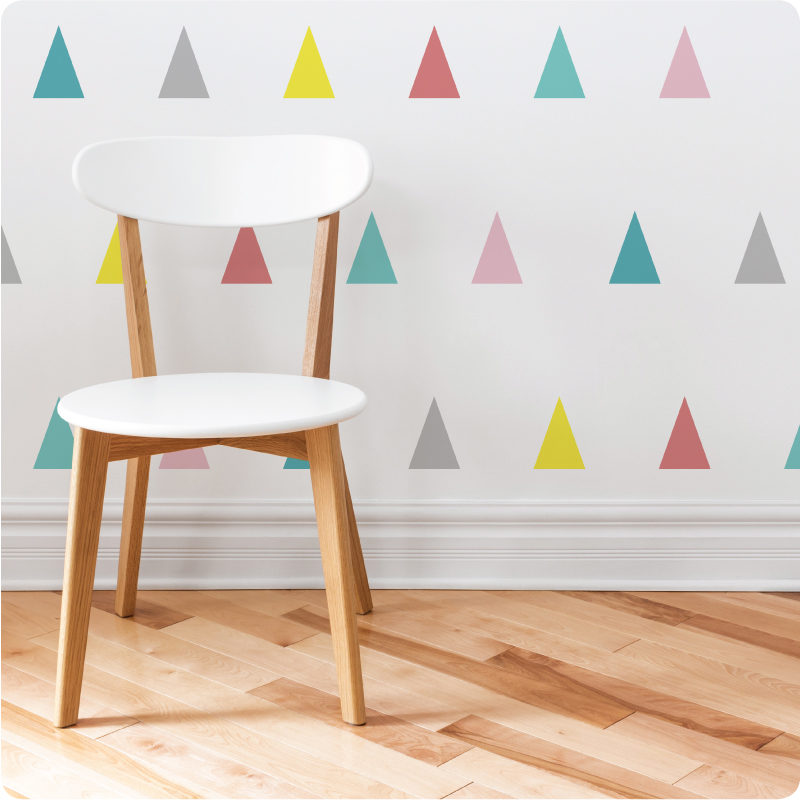 Triangle removable wall stickers decals behind a wooden chair