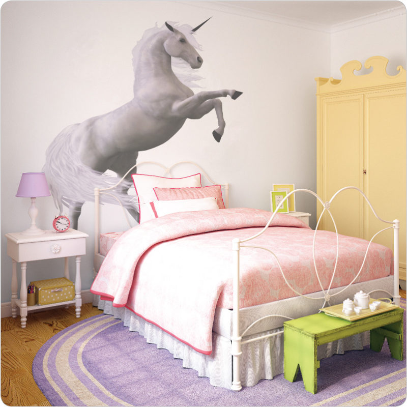 Horse wall decal behind a white bed and white side table