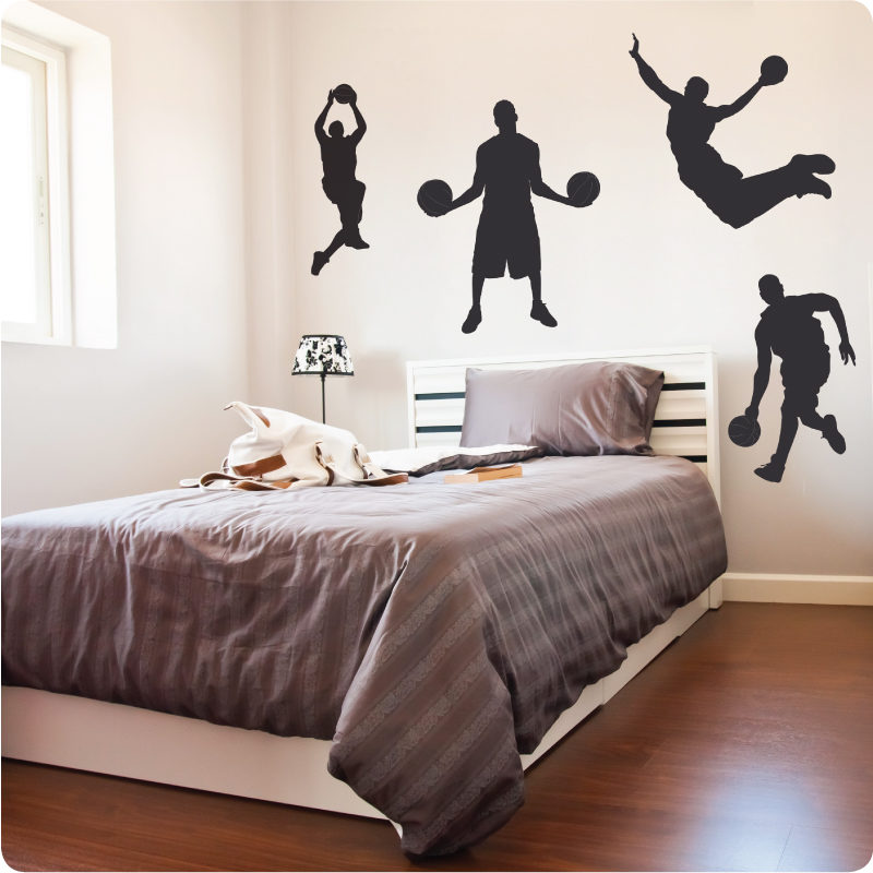 Basketball Guys removable wall sticker for boys room behind a bed