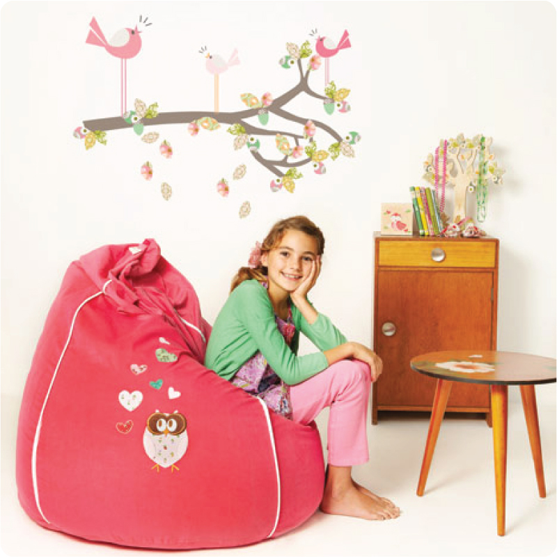 Enchanted Branch removable wall stickers by Cocoon Couture with a pretty girl smiling in front