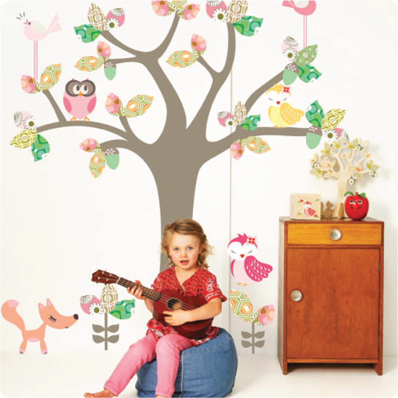 Enchanted Tree removable wall stickers by Cocoon Couture with little girl playing guitar in front