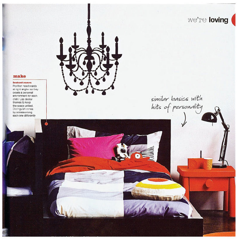 Chandelier removable wall sticker behind a bed