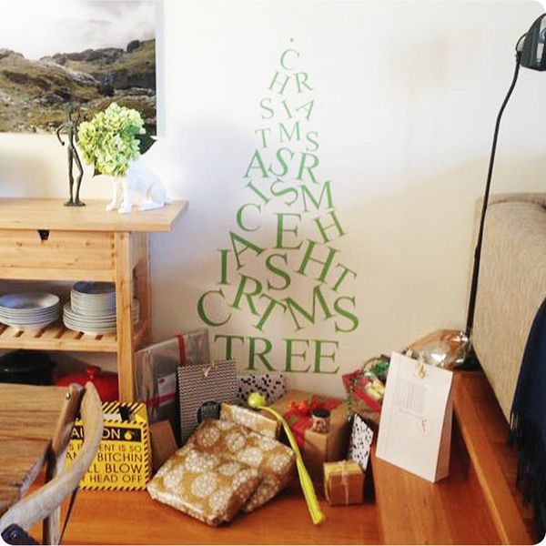 Christmas tree removable wall sticker behind the gifts