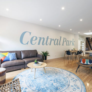 OPen plan home with large letters on wall Central Park