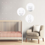 Modern nursery room with salmon red and greyaccents