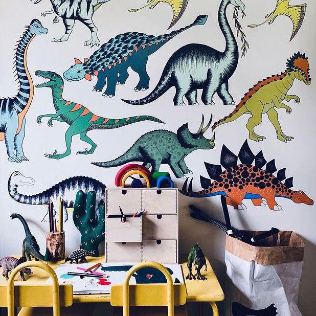 Dinosaur wall stickers behind a child's desk