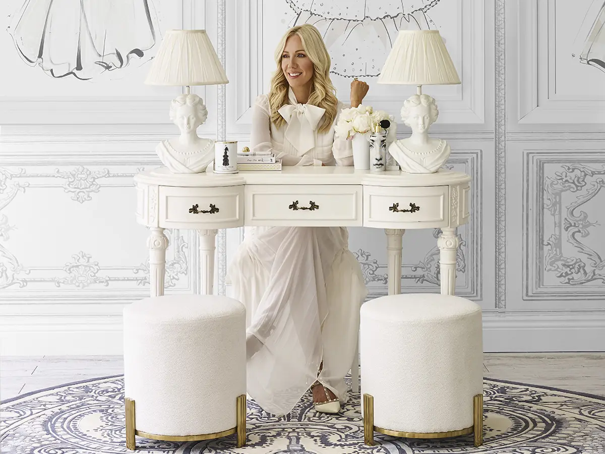 International fashion illustrator Megan Hess in her studio with custom wall decals designed and produced by The Wall Sticker Company.